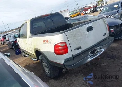 2002 Ford F-150 Lariat/Xlt z USA, uszkodzony, nr VIN 1FTRW08LX2KE34597